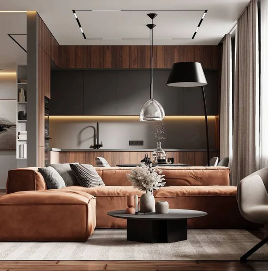 Расположение углового дивана в середине комнаты