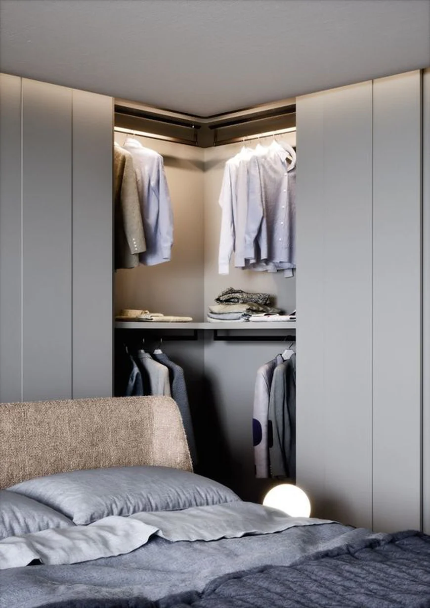 Кутова шафа в спальній кімнаті