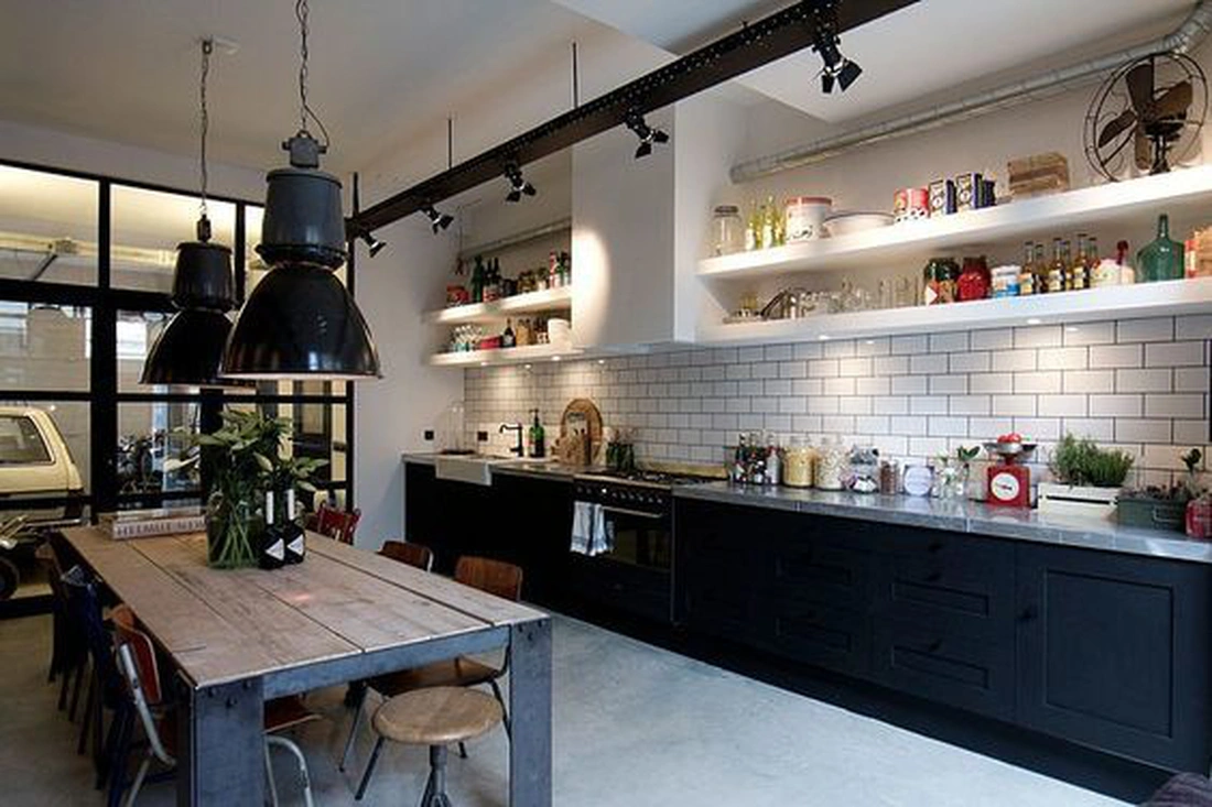Designed by Bricks Amsterdam, this eclectic garage loft is located in Amsterdam, Netherlands