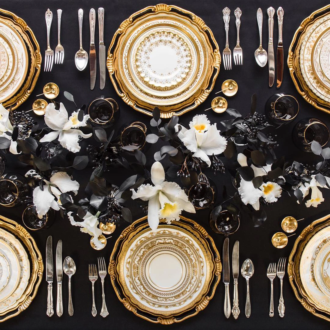 Florentine Chargers in Black/Gold + Crown Gold Collection Vintage China + Antique Silver Flatware + Bella 24k Gold Rimmed Stemless Glassware in Smoke
